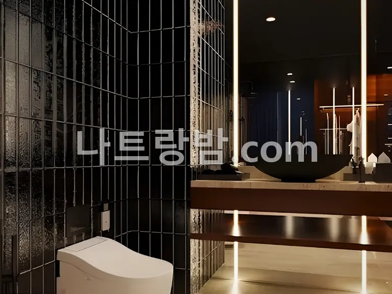검정 타일로 마감한 두바이 마사지의 욕실 공간